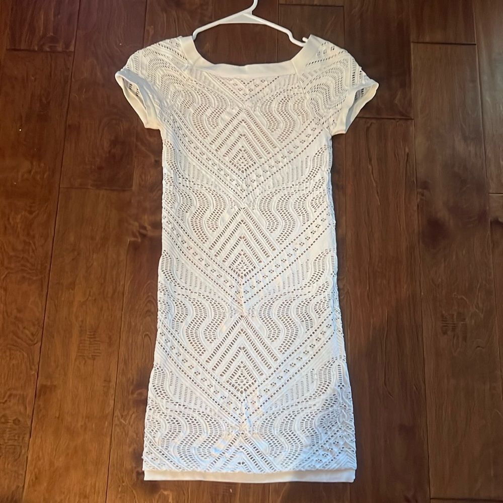 Bebe small, bodycon style white dress. Cap sleeves.